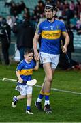 24 October 2021; Diarmuid Byrnes of Patrickswell with mascot John O'Donnell jnr before the Limerick County Senior Club Hurling Championship Final match between Kilmallock and Patrickswell at TUS Gaelic Grounds in Limerick. Photo by Piaras Ó Mídheach/Sportsfile