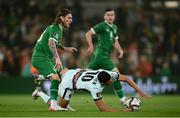 11 November 2021; Matheus Nunes of Portugal is tackled by Jeff Hendrick of Republic of Ireland during the FIFA World Cup 2022 qualifying group A match between Republic of Ireland and Portugal at the Aviva Stadium in Dublin. Photo by Stephen McCarthy/Sportsfile