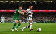 11 November 2021; Matheus Nunes of Portugal in action against Seamus Coleman of Republic of Ireland during the FIFA World Cup 2022 qualifying group A match between Republic of Ireland and Portugal at the Aviva Stadium in Dublin. Photo by Seb Daly/Sportsfile