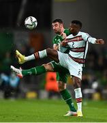 11 November 2021; Nélson Semedo of Portugal in action against Enda Stevens of Republic of Ireland during the FIFA World Cup 2022 qualifying group A match between Republic of Ireland and Portugal at the Aviva Stadium in Dublin. Photo by Eóin Noonan/Sportsfile
