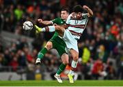 11 November 2021; Goncalo Guedes of Portugal in action against Josh Cullen of Republic of Ireland during the FIFA World Cup 2022 qualifying group A match between Republic of Ireland and Portugal at the Aviva Stadium in Dublin. Photo by Eóin Noonan/Sportsfile