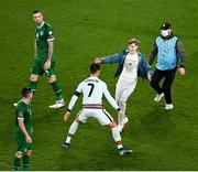 11 November 2021; A pitch invader approaches Cristiano Ronaldo of Portugal during the FIFA World Cup 2022 qualifying group A match between Republic of Ireland and Portugal at the Aviva Stadium in Dublin. Photo by Harry Murphy/Sportsfile
