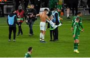 11 November 2021; Republic of Ireland supporter, Addison Whelan, is greeted by Cristiano Ronaldo of Portugal before getting his jersey after the final whistle of the FIFA World Cup 2022 qualifying group A match between Republic of Ireland and Portugal at the Aviva Stadium in Dublin. Photo by Ray McManus/Sportsfile