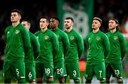 11 November 2021; Republic of Ireland players, from left, John Egan, Josh Cullen, Jamie McGrath, Chiedozie Ogbene, Enda Stevens, Callum Robinson and Jeff Hendrick during the national anthem before the FIFA World Cup 2022 qualifying group A match between Republic of Ireland and Portugal at the Aviva Stadium in Dublin. Photo by Seb Daly/Sportsfile