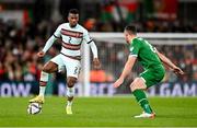 11 November 2021; Nélson Semedo of Portugal in action against Enda Stevens of Republic of Ireland during the FIFA World Cup 2022 qualifying group A match between Republic of Ireland and Portugal at the Aviva Stadium in Dublin. Photo by Seb Daly/Sportsfile