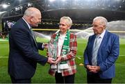 11 November 2021; FAI president Gerry McAnaney, left, presents the Hall of Fame award to former Republic of Ireland international Paula Gorham during the FIFA World Cup 2022 qualifying group A match between Republic of Ireland and Portugal at the Aviva Stadium in Dublin. Photo by Seb Daly/Sportsfile
