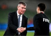 11 November 2021; Republic of Ireland manager Stephen Kenny meets a match official before the FIFA World Cup 2022 qualifying group A match between Republic of Ireland and Portugal at the Aviva Stadium in Dublin. Photo by Stephen McCarthy/Sportsfile