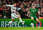 11 November 2021; Seamus Coleman of Republic of Ireland in action against Cristiano Ronaldo of Portugal during the FIFA World Cup 2022 qualifying group A match between Republic of Ireland and Portugal at the Aviva Stadium in Dublin. Photo by Stephen McCarthy/Sportsfile