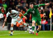11 November 2021; Matt Doherty of Republic of Ireland in action against Bruno Fernandes of Portugal during the FIFA World Cup 2022 qualifying group A match between Republic of Ireland and Portugal at the Aviva Stadium in Dublin. Photo by Stephen McCarthy/Sportsfile