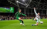 11 November 2021; Callum Robinson of Republic of Ireland in action against André Silva of Portugal during the FIFA World Cup 2022 qualifying group A match between Republic of Ireland and Portugal at the Aviva Stadium in Dublin. Photo by Stephen McCarthy/Sportsfile