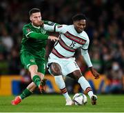 11 November 2021; Rafael Leao of Portugal in action against Matt Doherty of Republic of Ireland during the FIFA World Cup 2022 qualifying group A match between Republic of Ireland and Portugal at the Aviva Stadium in Dublin. Photo by Stephen McCarthy/Sportsfile