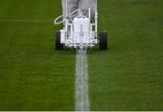 12 November 2021; Bohemians groundskeeper Derek Beauchamp tops up the paint on the pitch before the SSE Airtricity League Premier Division match between Bohemians and Shamrock Rovers at Dalymount Park in Dublin. Photo by Ramsey Cardy/Sportsfile