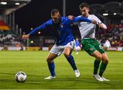 12 November 2021; Lorenzo Pirola of Italy in action against Conor Noss of Republic of Ireland during the UEFA European U21 Championship qualifying group A match between Republic of Ireland and Italy at Tallaght Stadium in Dublin. Photo by Piaras Ó Mídheach/Sportsfile