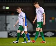 12 November 2021; Jake O'Brien of Republic of Ireland, right, and team-mate Ross Tierney leave the pitch after the UEFA European U21 Championship qualifying group A match between Republic of Ireland and Italy at Tallaght Stadium in Dublin. Photo by Eóin Noonan/Sportsfile