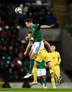 12 November 2021; Jonny Evans of Northern Ireland in action against Karolis Laukžemis of Lithuania during the FIFA World Cup 2022 qualifying group C match between Northern Ireland and Lithuania at National Football Stadium, Windsor Park in Belfast. Photo by David Fitzgerald/Sportsfile