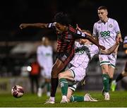 12 November 2021; Promise Omochere of Bohemians is tackled by Sean Hoare of Shamrock Rovers during the SSE Airtricity League Premier Division match between Bohemians and Shamrock Rovers at Dalymount Park in Dublin. Photo by Ramsey Cardy/Sportsfile