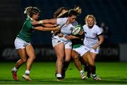 12 November 2021; Hope Rogers of USA is tackled by Alisa Hughes, left, and Sene Naoupu of Ireland during the Autumn Test Series match between Ireland and USA at RDS Arena in Dublin. Photo by Brendan Moran/Sportsfile