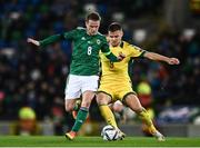 12 November 2021; Steven Davis of Northern Ireland in action against Karolis Laukžemis of Lithuania during the FIFA World Cup 2022 qualifying group C match between Northern Ireland and Lithuania at National Football Stadium, Windsor Park in Belfast. Photo by David Fitzgerald/Sportsfile