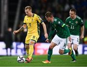 12 November 2021; Ovidijus Verbickas of Lithuania in action against Shane Ferguson, right, and Steven Davis of Northern Ireland during the FIFA World Cup 2022 qualifying group C match between Northern Ireland and Lithuania at National Football Stadium, Windsor Park in Belfast. Photo by David Fitzgerald/Sportsfile