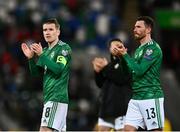 12 November 2021; Steven Davis, left, and Corry Evans of Northern Ireland applaud the support after the FIFA World Cup 2022 qualifying group C match between Northern Ireland and Lithuania at National Football Stadium, Windsor Park in Belfast. Photo by David Fitzgerald/Sportsfile