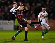 12 November 2021; Tyreke Wilson of Bohemians in action against Dylan Watts of Shamrock Rovers during the SSE Airtricity League Premier Division match between Bohemians and Shamrock Rovers at Dalymount Park in Dublin. Photo by Ramsey Cardy/Sportsfile