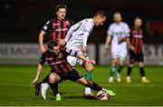 12 November 2021; Liam Burt of Bohemians in action against Graham Burke of Shamrock Rovers during the SSE Airtricity League Premier Division match between Bohemians and Shamrock Rovers at Dalymount Park in Dublin. Photo by Seb Daly/Sportsfile