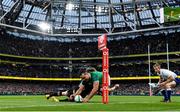 13 November 2021; James Lowe of Ireland scores his side's first try despite the tackle of Jordie Barrett of New Zealand during the Autumn Nations Series match between Ireland and New Zealand at Aviva Stadium in Dublin. Photo by Brendan Moran/Sportsfile