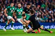 13 November 2021; Garry Ringrose of Ireland is tackled by Beauden Barrett of New Zealand during the Autumn Nations Series match between Ireland and New Zealand at Aviva Stadium in Dublin. Photo by Brendan Moran/Sportsfile