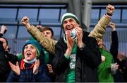 13 November 2021; Ireland supporters celebrate a try during the Autumn Nations Series match between Ireland and New Zealand at Aviva Stadium in Dublin. Photo by Brendan Moran/Sportsfile