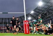 13 November 2021; Caelan Doris of Ireland is congratulated by Ireland team-mates Tadhg Beirne and Jack Conan after scoring his side's third try during the Autumn Nations Series match between Ireland and New Zealand at Aviva Stadium in Dublin. Photo by Ramsey Cardy/Sportsfile