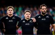 13 November 2021; New Zealand players, from left, Jordie Barrett, Beauden Barrett and Sam Whitelock during the national anthem before the Autumn Nations Series match between Ireland and New Zealand at Aviva Stadium in Dublin. Photo by Brendan Moran/Sportsfile