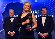 13 November 2021; Vikki Wall of Meath with her Senior Players Player of the Year award, in the company of Ard Stiúrthóir TG4 Alan Esslemont, left, and President of the LGFA Mícheál Naughton, during the TG4 Ladies Football All Stars Awards banquet, in association with Lidl, at the Bonnington Hotel, Dublin. Photo by Brendan Moran/Sportsfile