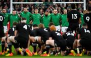 13 November 2021;  Ireland players, from left, Jonathan Sexton, Tadhg Furlong, Tadhg Beirne, Jonathan Sexton, Bundee Aki, Finlay Bealham, James Lowe and Andrew Porter watch New Zealand perform the Haka before the Autumn Nations Series match between Ireland and New Zealand at Aviva Stadium in Dublin. Photo by Ramsey Cardy/Sportsfile
