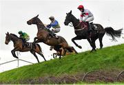 14 November 2021; Runners and riders, from left, Midnight Maestro, with Mark Walsh up, Rolling Revenge, with Adam Short up, and Robin Des Foret, with Ben Harvey up, jump Ruby's Double during the Pigsback.com Risk Of Thunder Steeplechase on day two of the Punchestown Winter Festival at Punchestown Racecourse in Kildare. Photo by Seb Daly/Sportsfile