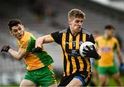 14 November 2021; Billy Mannion of Mountbellew Moylough in action against Gavin Burke of Corofin during the Galway County Senior Club Football Championship Final match between Corofin and Mountbellew / Moylough at Pearse Stadium in Galway. Photo by David Fitzgerald/Sportsfile
