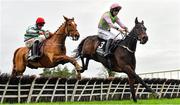 14 November 2021; Sharjah, right, with Patrick Mullins up, jumps the last on their way to winning the Unibet Morgiana Hurdle, from second place Zanahiyr, left, with Davy Russell up, during day two of the Punchestown Winter Festival at Punchestown Racecourse in Kildare. Photo by Seb Daly/Sportsfile
