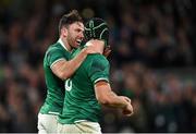 13 November 2021; Caelan Doris, right, is congratulated by Ireland teammate Hugo Keenan after scoring his side's third try during the Autumn Nations Series match between Ireland and New Zealand at Aviva Stadium in Dublin. Photo by Ramsey Cardy/Sportsfile