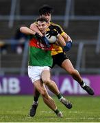 14 November 2021; Conor Madden of Gowna is tackled by Mark Magee of Ramor United during the Cavan County Senior Club Football Championship Final Replay match between Gowna and Ramor United at Kingspan Breffni in Cavan. Photo by Ben McShane/Sportsfile