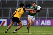 14 November 2021; Conor Madden of Gowna is tackled by Mark Magee of Ramor United during the Cavan County Senior Club Football Championship Final Replay match between Gowna and Ramor United at Kingspan Breffni in Cavan. Photo by Ben McShane/Sportsfile