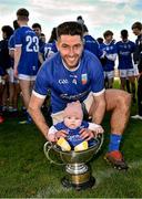 14 November 2021; Paul McConway of Tullamore with his daughter Ailbhe, aged 5 months, in the trophy after the Offaly County Senior Club Football Championship Final replay match between Rhode and Tullamore at Bord Na Móna O'Connor Park in Tullamore, Offaly. Photo by Harry Murphy/Sportsfile