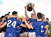 14 November 2021; Johnny Moloney of Tullamore lifts the trophy with team-mates after the Offaly County Senior Club Football Championship Final replay match between Rhode and Tullamore at Bord Na Móna O'Connor Park in Tullamore, Offaly. Photo by Harry Murphy/Sportsfile