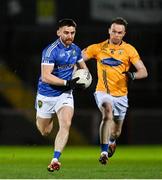14 November 2021; Padraig Hampsey of Coalisland in action against Tommy McCarron of Dromore during the Tyrone County Senior Club Football Championship Final match between Coalisland and Dromore at O’Neills Healy Park in Omagh, Tyrone. Photo by Ramsey Cardy/Sportsfile