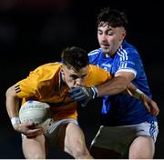 14 November 2021; Emmett McNabb of Dromore is tackled by Jack Fee of Coalisland during the Tyrone County Senior Club Football Championship Final match between Coalisland and Dromore at O’Neills Healy Park in Omagh, Tyrone. Photo by Ramsey Cardy/Sportsfile
