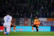 14 November 2021; Chiedozie Ogbene of Republic of Ireland takes a knee before the FIFA World Cup 2022 qualifying group A match between Luxembourg and Republic of Ireland at Stade de Luxembourg in Luxembourg. Photo by Stephen McCarthy/Sportsfile