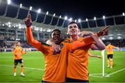 14 November 2021; Chiedozie Ogbene of Republic of Ireland celebrates with team-mate John Egan after scoring his side's second goal during the FIFA World Cup 2022 qualifying group A match between Luxembourg and Republic of Ireland at Stade de Luxembourg in Luxembourg. Photo by Stephen McCarthy/Sportsfile