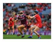 12 September 2021; Possession comes dropping slow. Orlaith McGrath of Galway only has eyes for the sliotar as Cork’s Pamela Mackey closes in during camogie All-Ireland finals day at Croke Park. Orlaith is one of three sisters on the winning panel alongside Siobhán, who scored their crucial goal, and Niamh. Photo by Piaras Ó Mídheach/Sportsfile This image may be reproduced free of charge when used in conjunction with a review of the book &quot;A Season of Sundays 2020&quot;. All other usage © Sportsfile