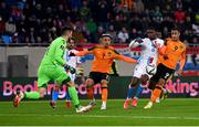 14 November 2021; Adam Idah, right, and Callum Robinson of Republic of Ireland in action against Christopher Martins Pereira and Luxembourg goalkeeper Ralph Schon during the FIFA World Cup 2022 qualifying group A match between Luxembourg and Republic of Ireland at Stade de Luxembourg in Luxembourg. Photo by Stephen McCarthy/Sportsfile