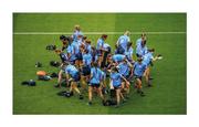 14 August 2021; Putting their game faces on. The Dublin ladies football team, aiming for a fifth senior title in a row, know the drill at this stage as they break away after the team photo. Former Ireland rugby international Hannah Tyrrell scores five points from play in this semi-final and is named player of the match, crowning a wonderful week in which she got married. Photo by Stephen McCarthy/Sportsfile This image may be reproduced free of charge when used in conjunction with a review of the book &quot;A Season of Sundays 2020&quot;. All other usage © Sportsfile