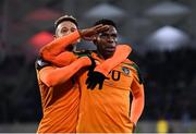 14 November 2021; Chiedozie Ogbene of Republic of Ireland celebrates with team-mate Callum Robinson, left, after scoring his side's second goal during the FIFA World Cup 2022 qualifying group A match between Luxembourg and Republic of Ireland at Stade de Luxembourg in Luxembourg. Photo by Stephen McCarthy/Sportsfile