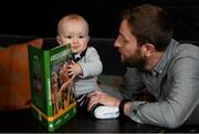 15 November 2021; Sportsfile Photographer Seb Daly with his son, Senan, aged seven months, from Glasnevin, Dublin, at the launch of A Season of Sundays 2021 at Croke Park Hotel in Dublin. Photo by Harry Murphy/Sportsfile